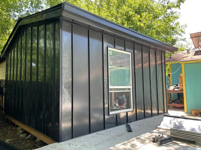 Black standing seam metal wall panels for Metal Roof Installation in Monee