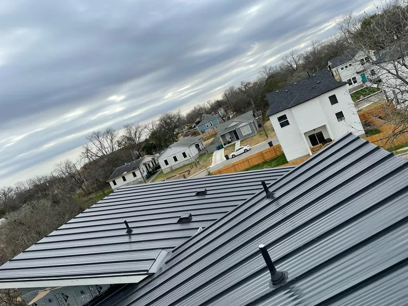 Standing seam metal roof panels with vents for Skylight Repair in Monee